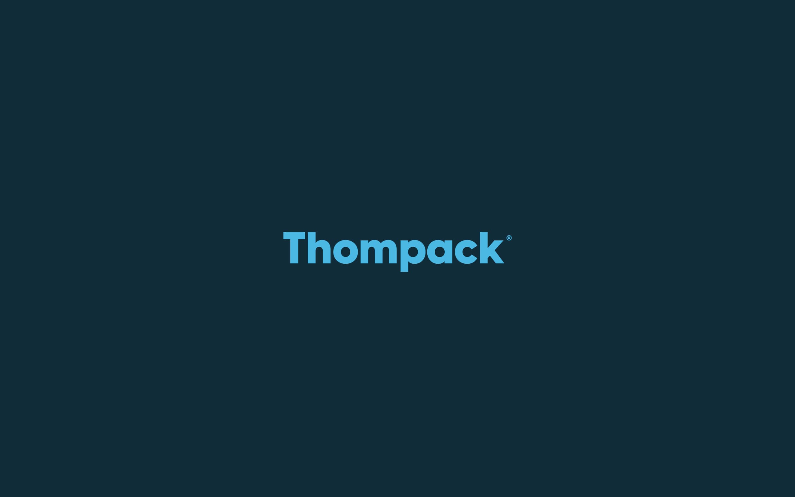 Thompack industrial packaging brand identity logo on a dark blue background.