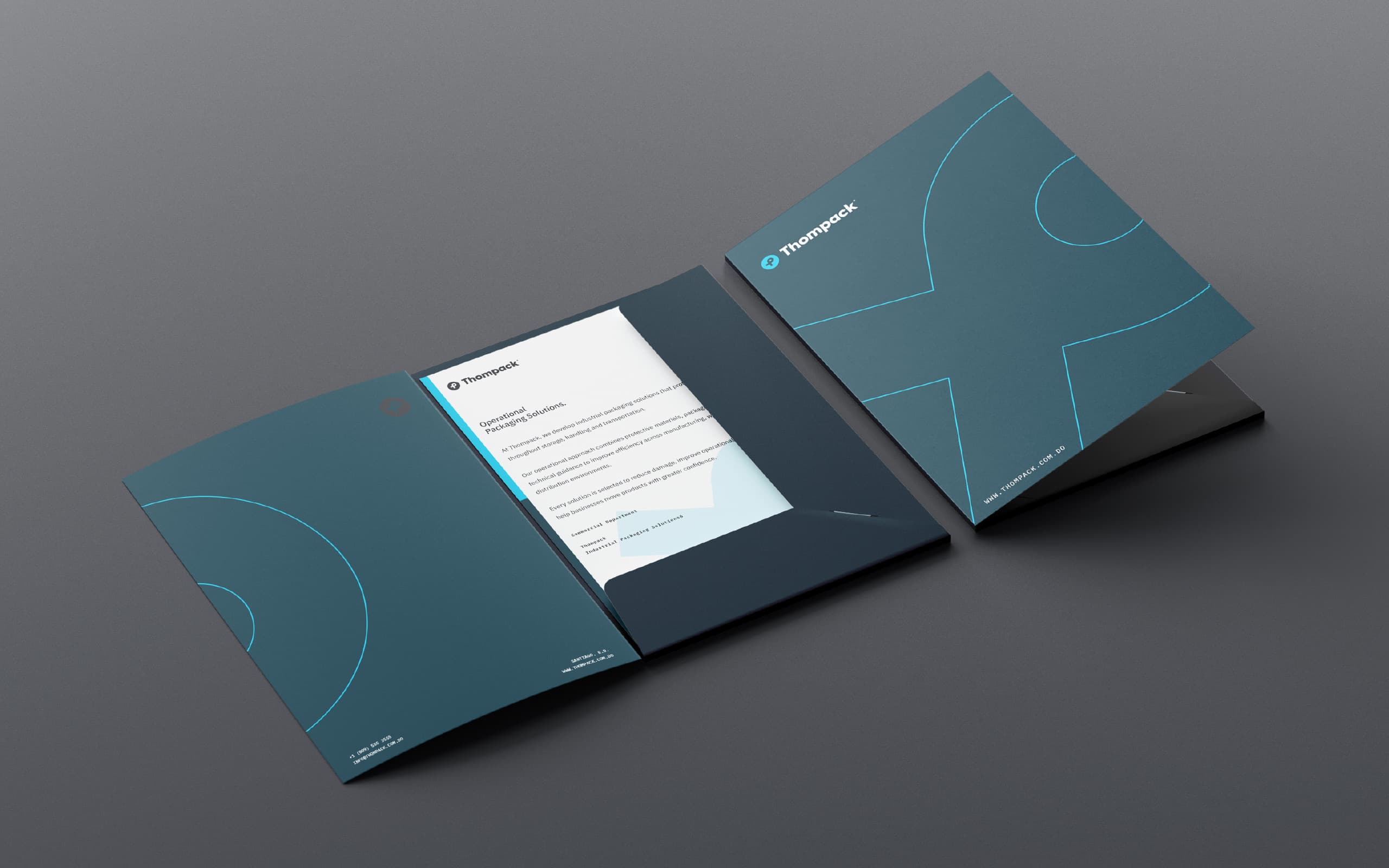Thompack corporate folder and stationery system for a B2B industrial packaging brand identity.